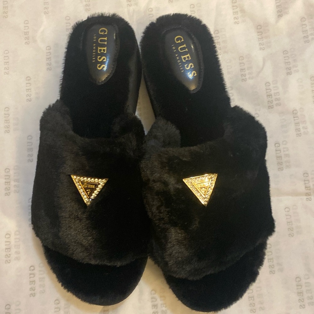 Fur slip on Guess shoes